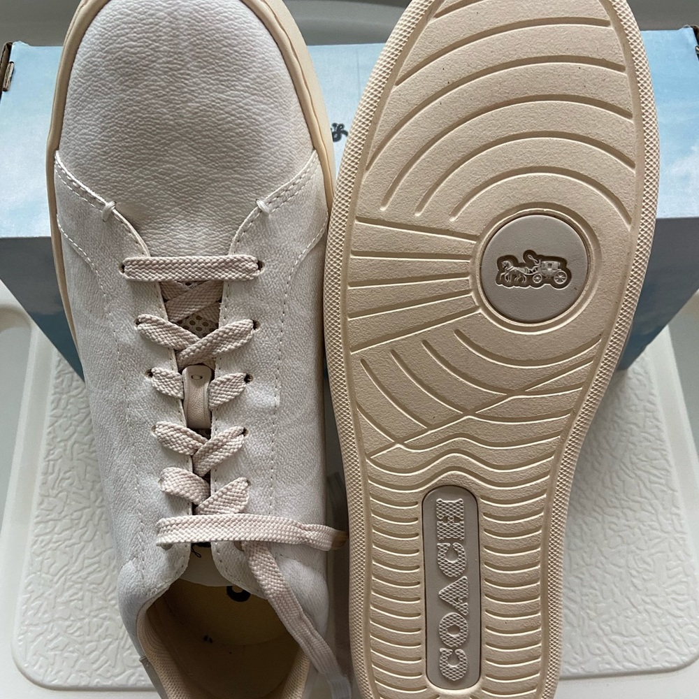 Coach Lace Up Sneakers. Excellent condition. Never worn.